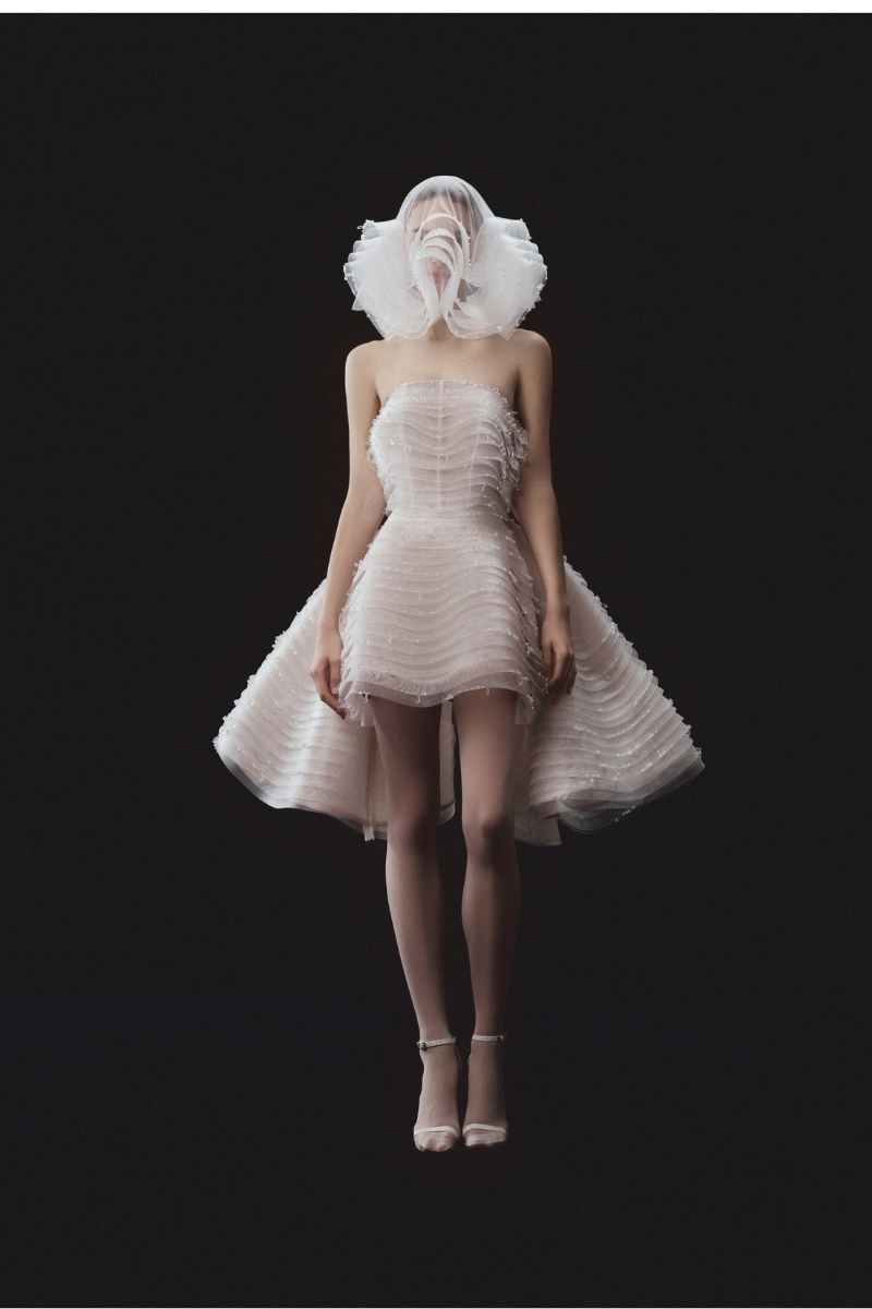 SLEEVELESS BEADED AND LAYERED BUSTIER DRESS WITH MATCHING OVERSKIRT