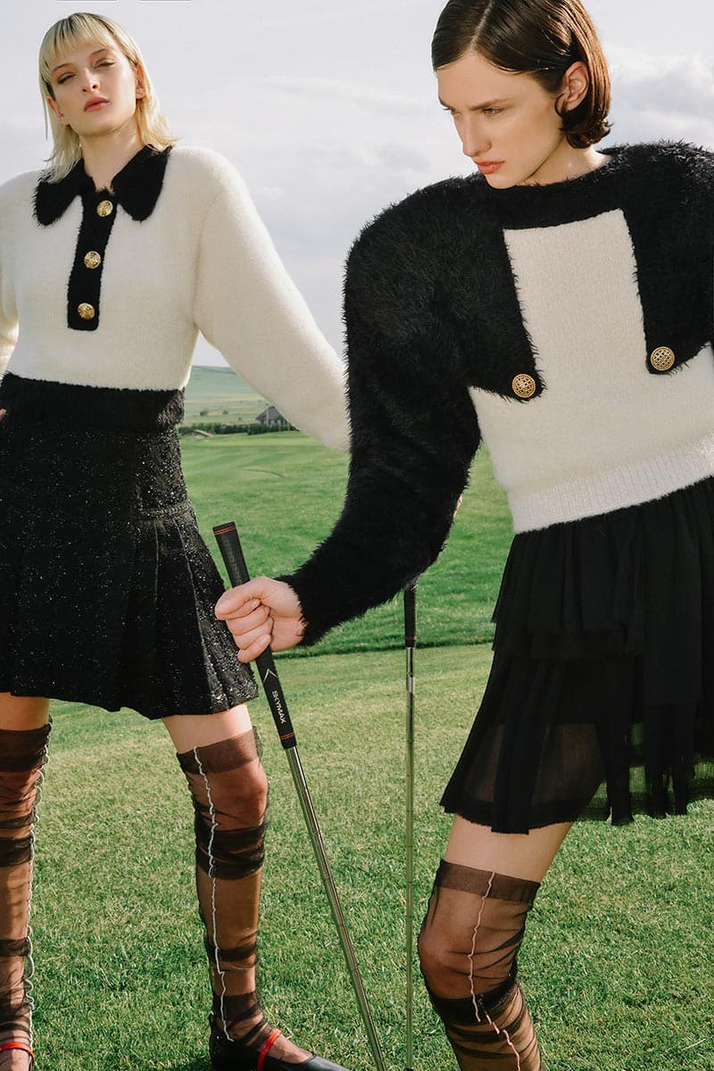 STRUCTURED SHOULDER BLACK AND WHITE SWEATER